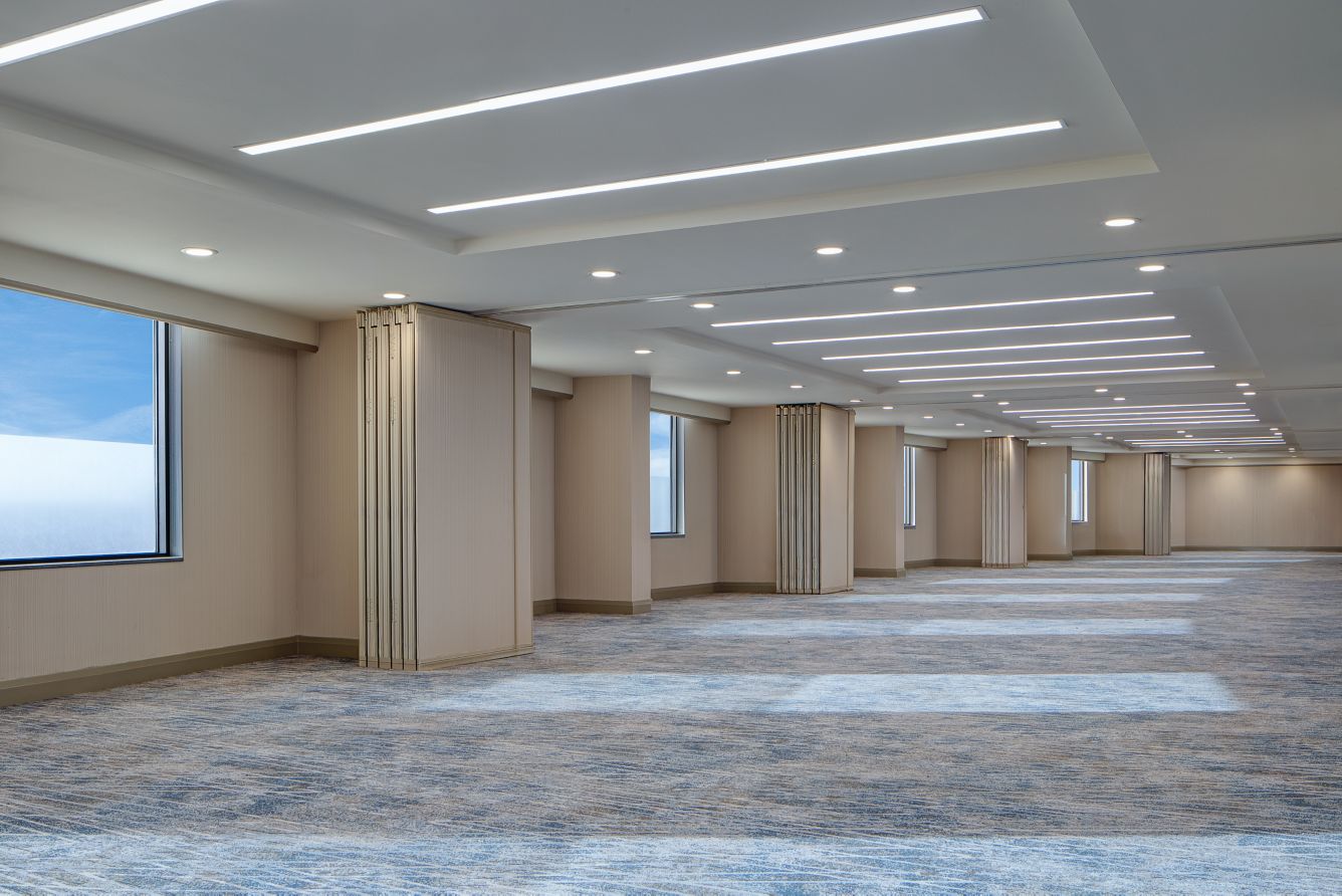 Commercial operable partition walls stacked across a flexible event space