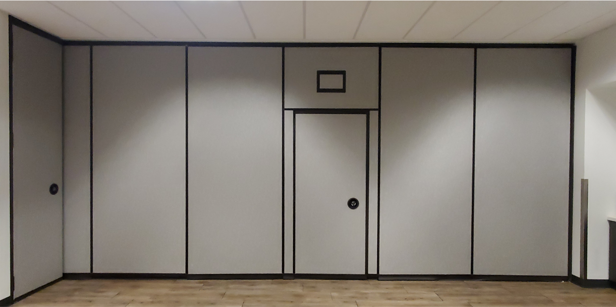 Completed operable partition wall with an integrated pass door.