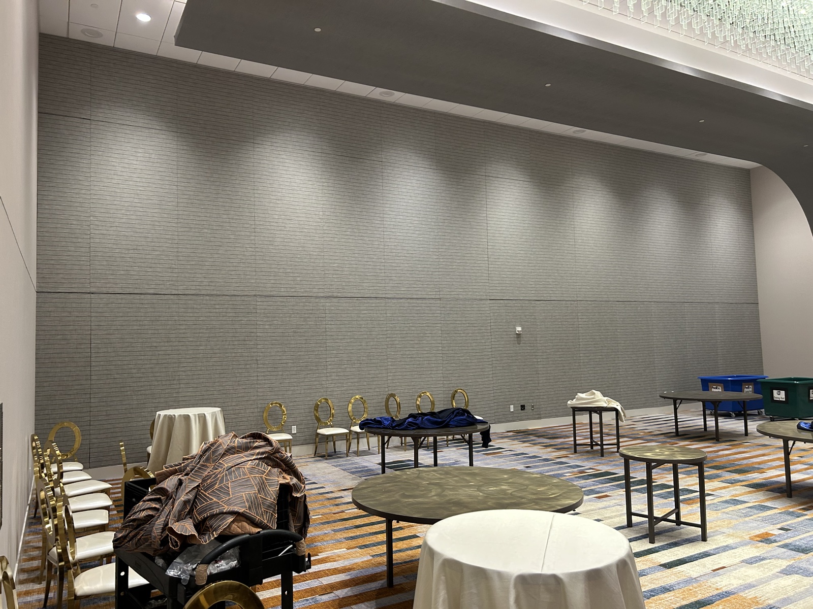 Finished textured operable partition wall in a hotel ballroom.