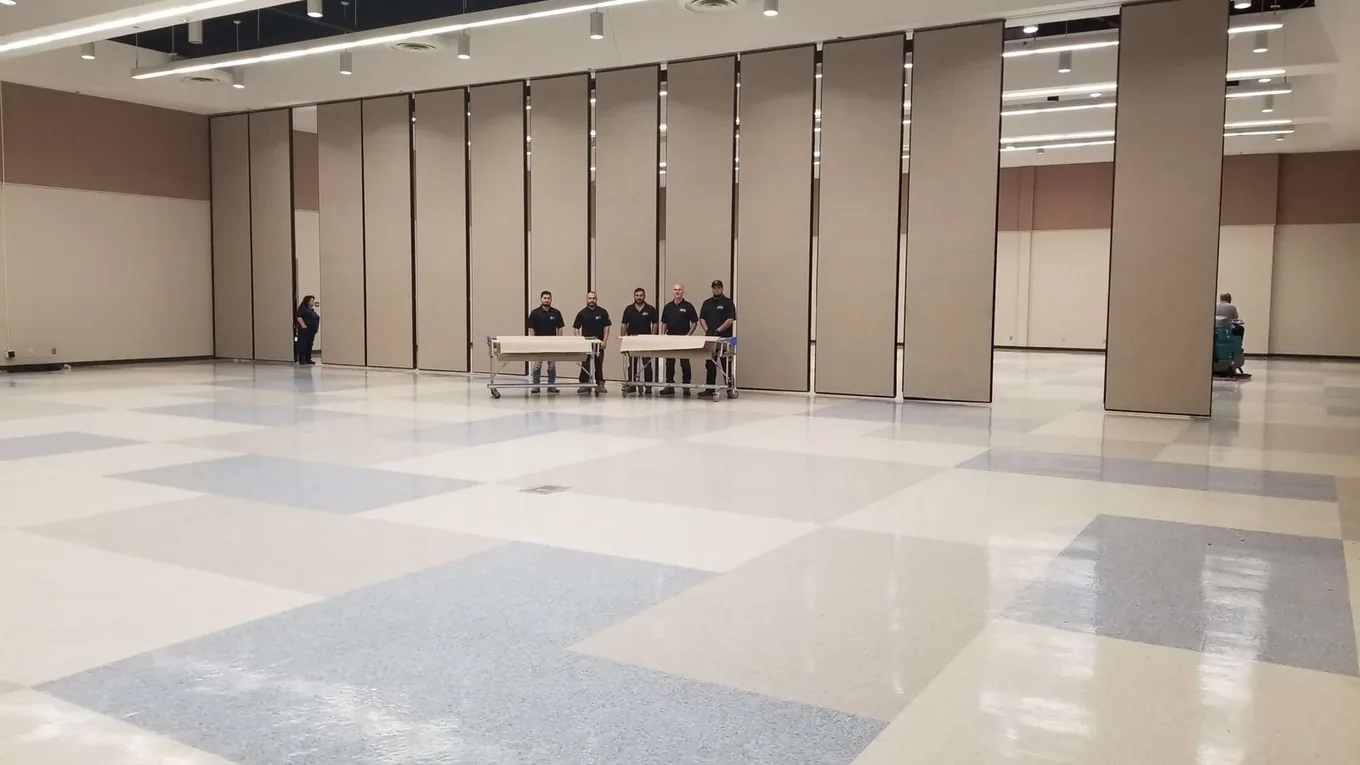 Large completed operable wall installation with the MotionSpan team in a commercial interior.